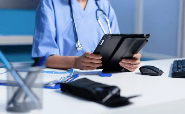 The doctor studies the medical history